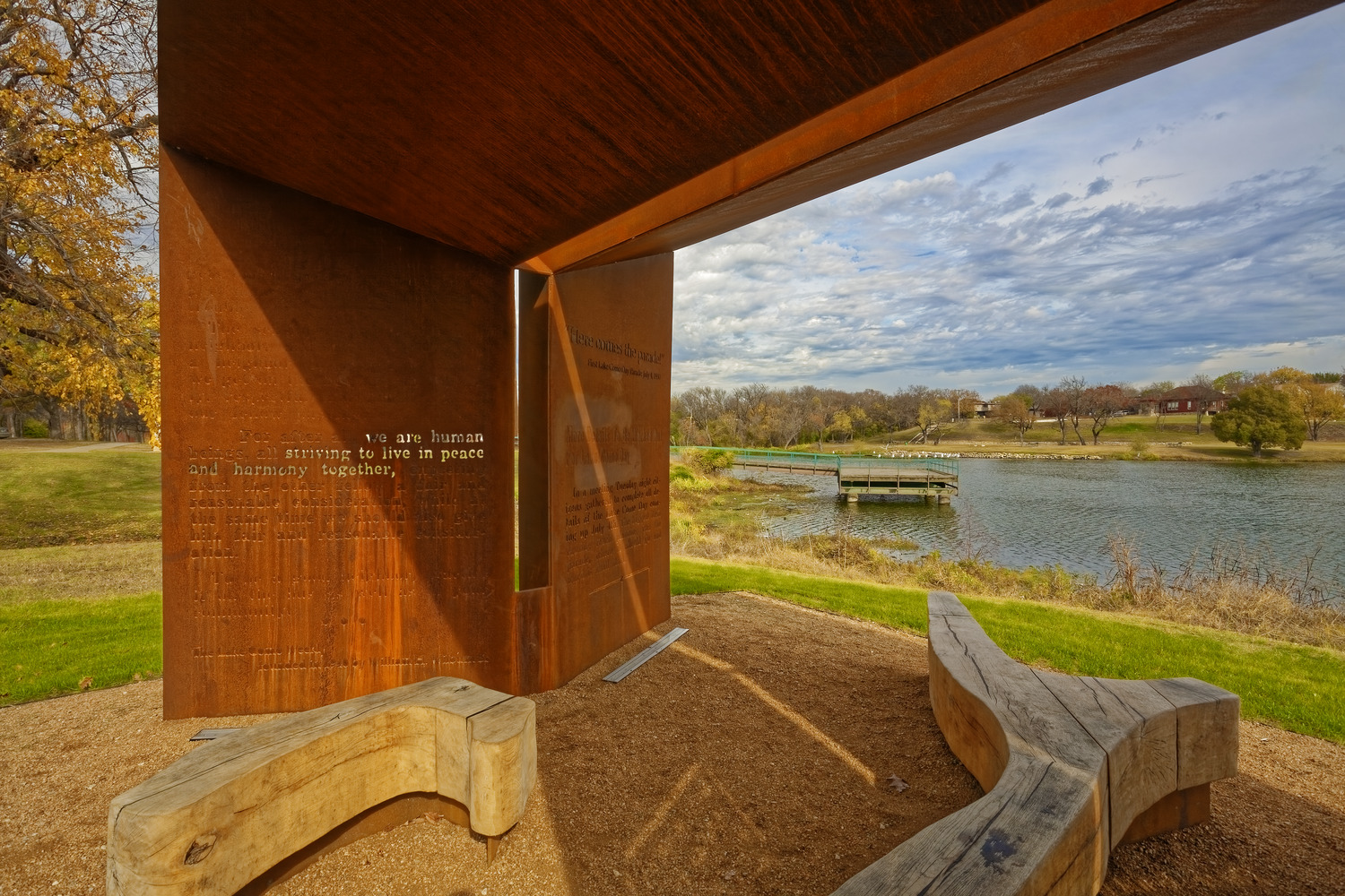 Do Something GOOD For Your Neighbor RDG Dahlquist Art Studio, 2021 Engraved weathering steel with white oak benches Lake Como Park, Fort Worth, Texas (photo by Matt Niebuhr)